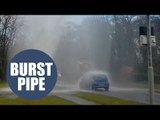 Dramatic video shows cars battered by water erupting from burst pipe
