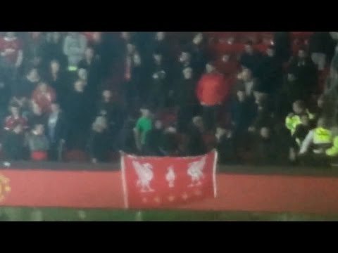 Liverpool Fans Sitting In Manchester United Home Section Unfurl Flag After Goal Resorting In Fights