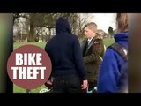 Video shows the moment a school boy has his bike stolen by two thugs