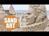 Sand artists create stunning sculptures for circus themed festival