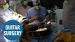 Musician serenades surgeons while they operate on his BRAIN