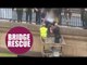 Hero scaffolders use harness and a cherry picker to save a woman on a bridge