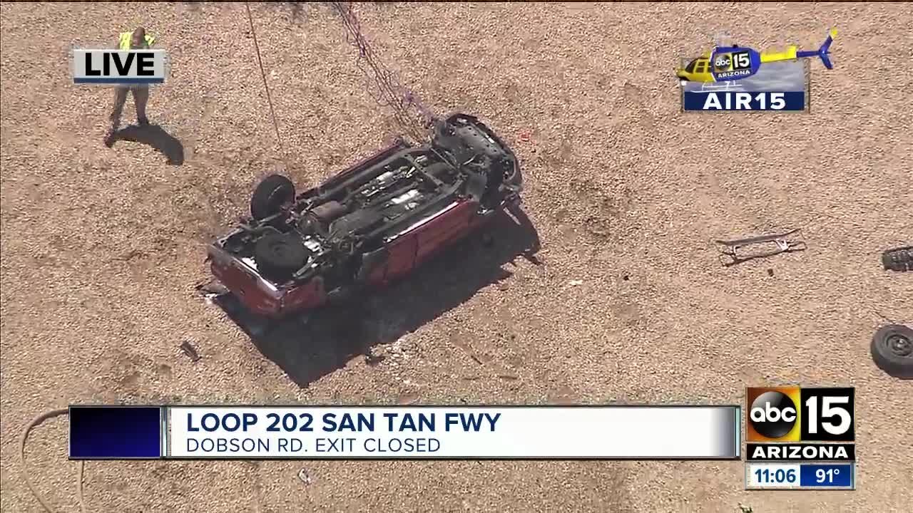 Fiery rollover shuts down freeway exit
