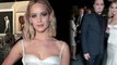 Jennifer Lawrence smolders in white silk while crossing paths with ex Darren Aronofsky at BAM Gala