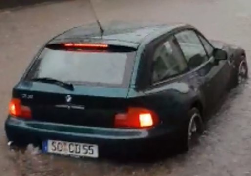 Cars Submerged on German Town's Streets Following Days of Rain
