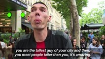 World's tallest people stroll the streets of Paris