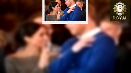 What member of the royal family is missing from the wedding picture of Meghan Markle and Harry