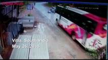 A man had an incredibly lucky escape in India when he crashed into a bus but avoided being crushed by the smallest of margins on Saturday.His scooter went und
