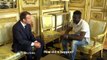 French President Emmanuel Macron speaks with #MamoudouGassama, 22, from Mali, at the presidential #ElyseePalace in Paris on Monday. Macron praised Gassama for s