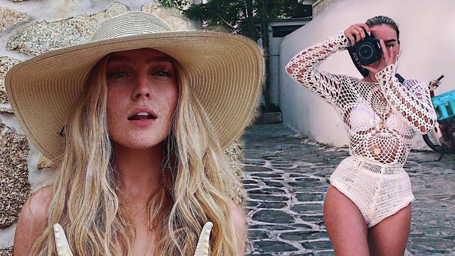 Perrie Edwards goes TOPLESS: Little Mix singer reveals her stomach scar as she poses with two starfish in Mykonos