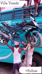Indian Porter Loading a Sports Bike  to the top of the Bus Without others help...!!!!!!