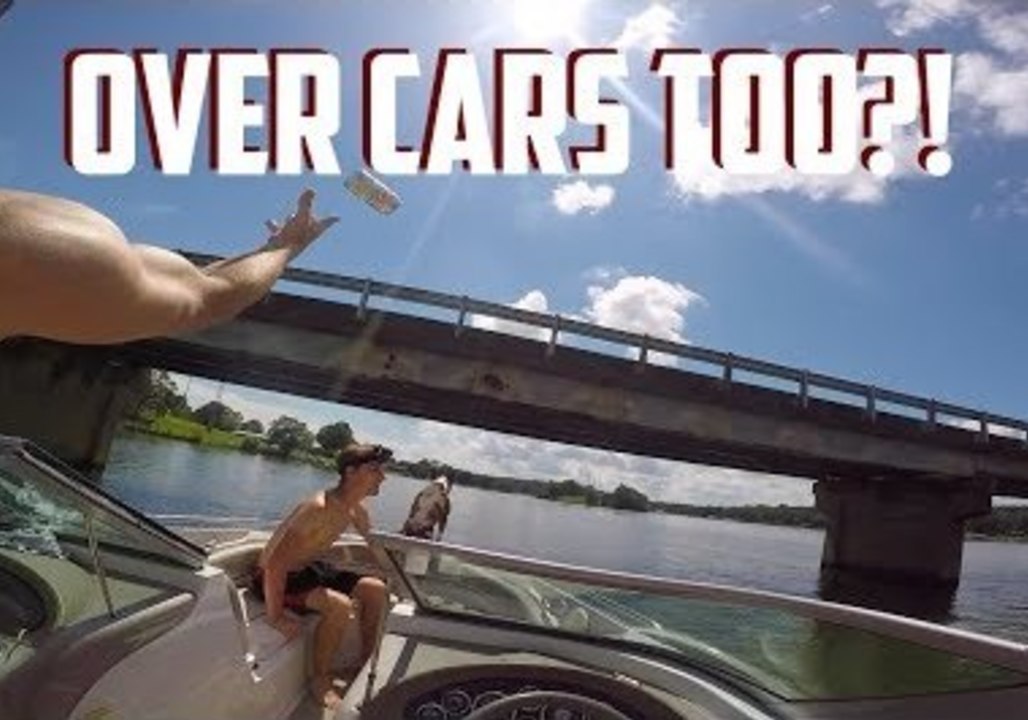 Epic Beer Toss Over Active Bridge From Speed Boat