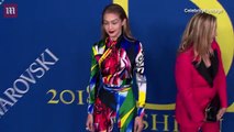 Gigi Hadid wears an 80's inspired colorful jumpsuit to the CFDAs