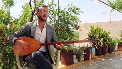 Afrinli Kürt genç memleketine sazıyla sözüyle döndü (2)