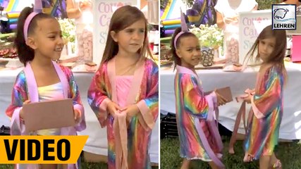 North West & Penelope Disick Twinning In Rainbow Robes At Their Bday Bash