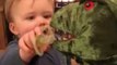 Baby Shares His Dummy With Toy Dinosaur