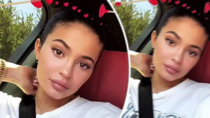 Kylie Jenner looks flawless with earth tone makeup as she takes selfie in her $275K red Rolls-Royce