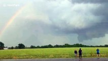 Footage captures rare sighting of rainbow and tornado in sky at same time