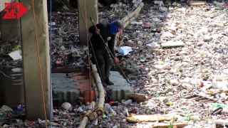 Một con sông và kênh rạch đầy rác ở  Manila