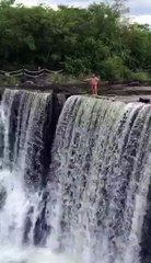 Watch Live--:A Man easily Climbing a waterfall...!!!Mind blowing performance...!!!!