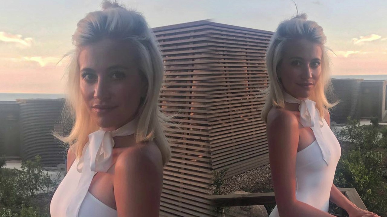 Pixie Lott flaunts her jaw-dropping figure in skimpy white swimsuit as she enjoys stunning sunset in Sicily