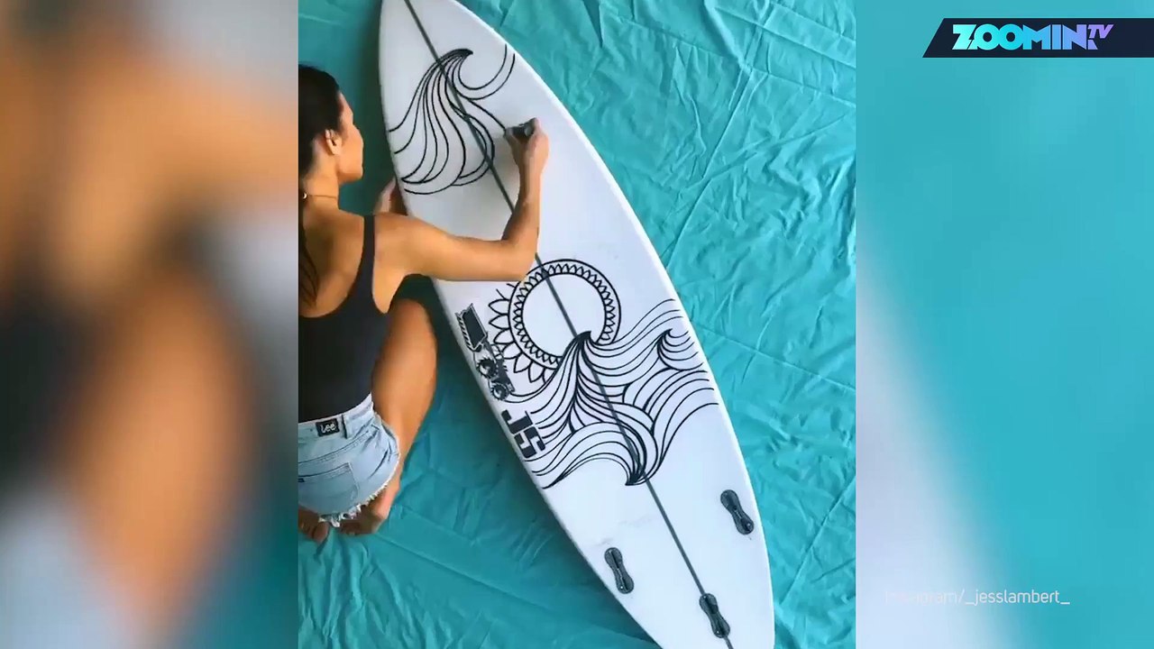 Surfbrett an Land: Künstlerin bemalt Boards