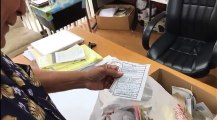 The old man shuffles through a box of papers – records of all the phone calls he'd made to Chamorro Land Trust applicants and leaseholders.