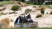 Golf cart gets stuck in sand dune