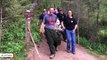Heartwarming Image Shows Rescue Team Carrying Dehydrated 120-Pound Dog Down Mountain