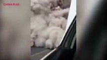 A police car was engulfed by a huge ash cloud in just seconds following Sunday's volcanic eruption in Guatemala in which at least 65 people were killed.Accord