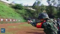 In southwest China's Yunnan Province, armed police held a shooting competition. During the 3-day contest, 220 officers participated in 32 live-fire events, faci