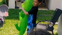 Alligator Lurks Inches Away While Boy Plays In The Yard