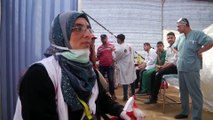 Yardım meleği Rezzan'ın annesi Sabrin en-Neccar İsrail sınırında -HAN YUNUS