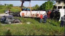 LUCKY ESCAPETwo women who were in this car somehow survived when a tanker truck overturned and crushed their vehicle on the notorious M-2 Ring Road in Princes