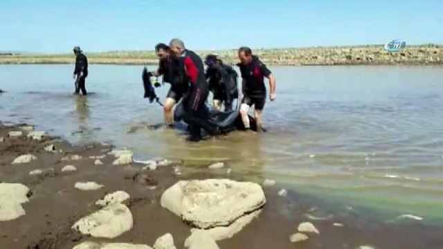 Serinlemek için baraj gölüne giren iki çocuk boğularak can verdi
