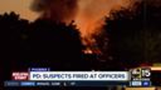 Shots heard, flames seen during Phoenix standoff with armed robbery suspects