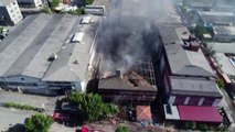 Yangın nedeniyle çatısı ve duvarları çöken iş merkezi havadan görüntülendi