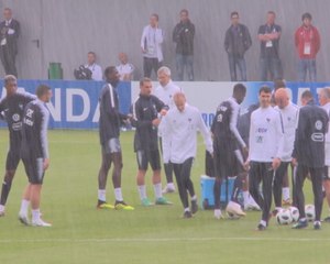 France team caught in Moscow downpours