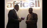 Hey Africell'ers Here is our Chief Corporate Affairs Officer, Mr Joe Abass Bangura,  presenting an #Africell 4G LTE MiFi to the CEO of AYV Media Empire Ambass