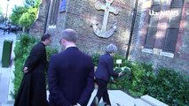 Theresa May lays wreath to tribute Grenfell Tower victims