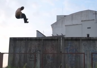Daredevil Jumps Off a Two-Story Building in a Perfect Double-Sided Flip