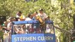 Steph Curry holds the trophy along with Ayesha and daughter Riley and the Warriors' fans go crazy  - Warriors Championship Parade - June 12, 2018