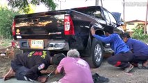 Python In Tug-of-War After Being Caught In Pick-up Truck