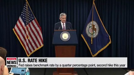 Fed hikes rates, points to 2 more increases by end of 2018
