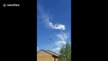 Firefighting helicopter en route to Buffalo Fire in Colorado county