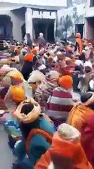 Sikhs Giving Rupees 2000 Note To Poor And Helpless Peoples