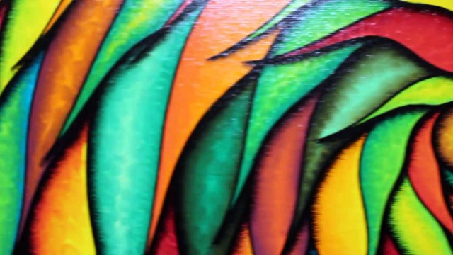 Tableau Posca : Spirale verdoyante et rougeyante.