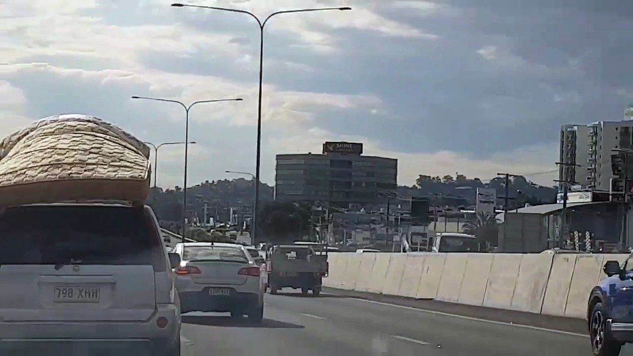 Car Drives With Mattress Loosely Secured