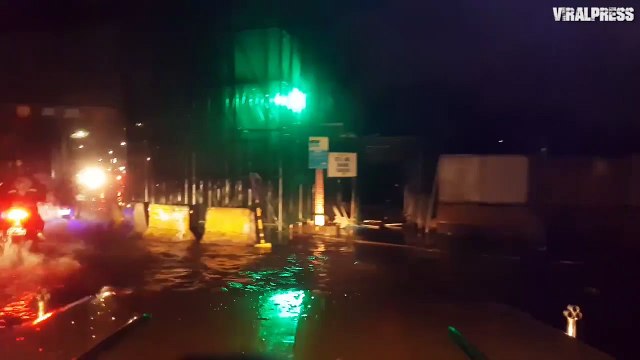 Driving Through Flooded Road