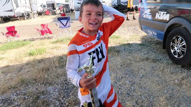 FINISHING FIRST SERIES OF MOTOCROSS WITH A TROPHY KIDS FIRST DIRT BIKE RACE AWARD